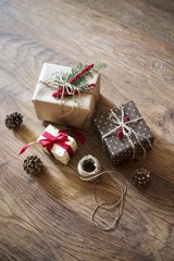 christmas gifts on wooden background