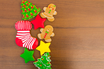 Festive tasty Christmas cookies on wooden table. Top view
