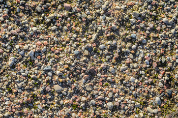 Gravel, pebbles and sand closeup texture