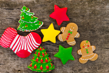 Festive tasty Christmas cookies on wooden table. Top view