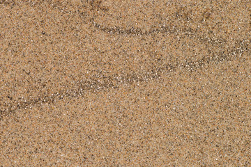 Fototapeta na wymiar Golden sand background. Fine sea sand texture.