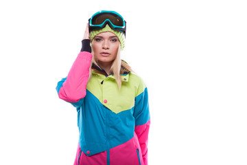 beautiful young blonde woman in colorful snow coat