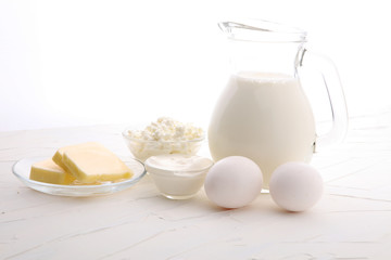 still life with dairy products, milk, eggs, butter with a lot of calcium.