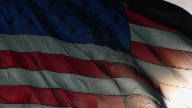 American Flag Waiving In The Wind Close Up