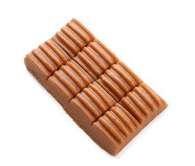 Sweet caramel bar on white background