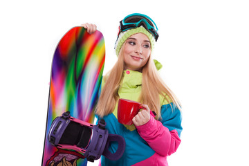 pretty young woman in ski outfit and ski glasses hold snowboard