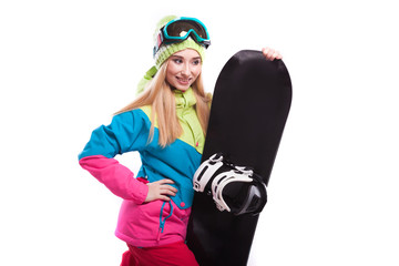 pretty young woman in ski outfit and ski glasses hold snowboard