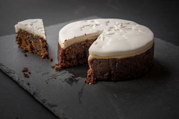 Christmas cake with slice cut out