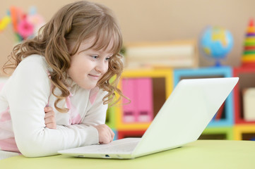 cute girl using laptop  