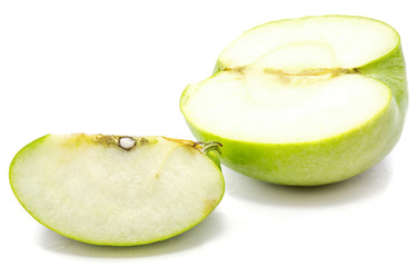 Granny Smith sliced apple, one half and slice, isolated on white background