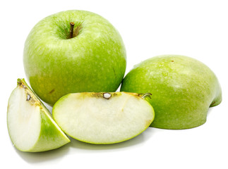 One whole apple Granny Smith, two slices and one half, isolated on white background 