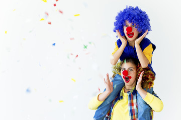 A portrait of two clowns