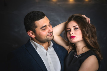 portrait of a pair of brunettes male and female