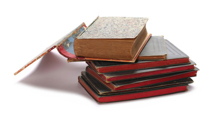 Stack of old antique big books isolated on white background
