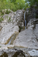 Fototapeta na wymiar mountain waterfall cascate di montagna