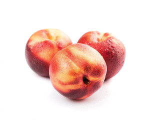 Fresh raw nectarine isolated on white