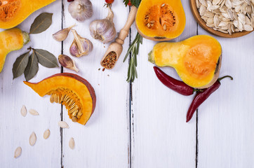 fresh pumpkin with seeds, garlic and spices