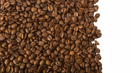 Roasted coffee beans   over white background with space  for text or image
