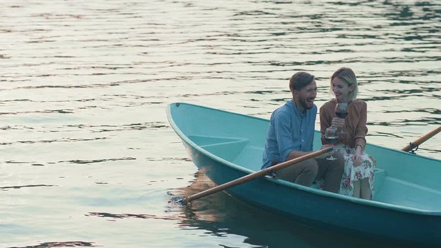 Romantic couple in a boat outdoors