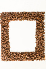 Roasted coffee beans  frame over white background with space  for text or image