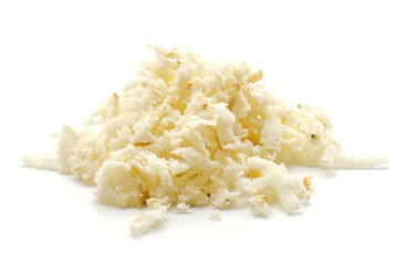 Freshly grated mash of horseradish root isolated on white background