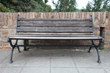 An old bench in a typical Italian square