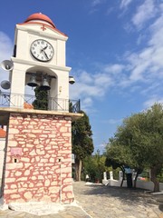 Fototapeta na wymiar Greek clock tower in Skiathos