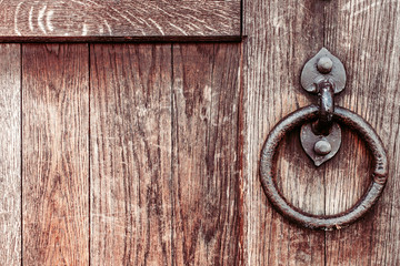 wooden door gate with a forged handle ring