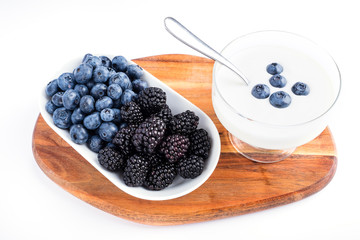 Healthy Greek yogurt bowl with fresh berry, on a white background