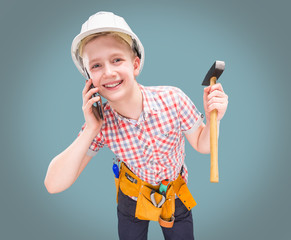 portrait of a young builder in a helmet and a tape measure in his hand