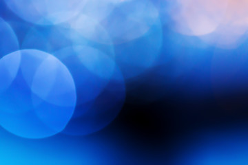 Abstract xmas Blue glitter lights. Christmas festive  background. Defocused bokeh  particles. Template for design