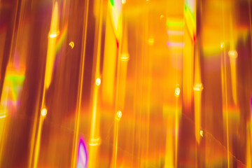 Fototapeta na wymiar Abstract xmas Gold sparkles or glitter lights. Christmas festive gold background. Defocused bokeh particles. Template for design