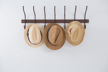 Hats hanging on hook