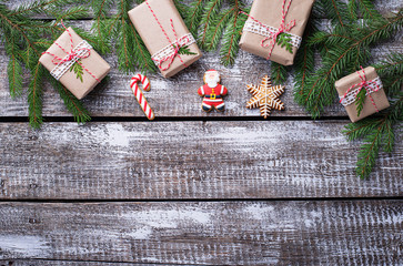 Obraz na płótnie Canvas Christmas background with gift boxes and gingerbread cookies
