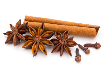 Cloves, anise and cinnamon isolated on white background.