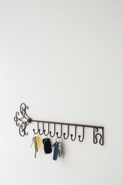 Various keys hanging on hook