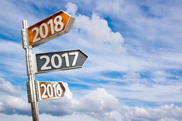 2018 direction sign with sky background. New year concept
