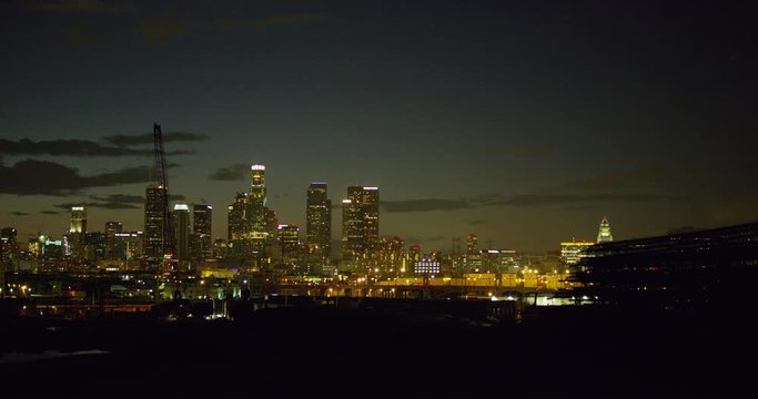 DTLA skyline view at sunset from East LA sixth street bridge, Los Angeles, California