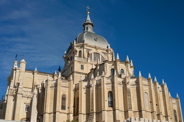 Fototapeta na wymiar Detail of the facade of La Almudena cathedral in Madrid, Spain.