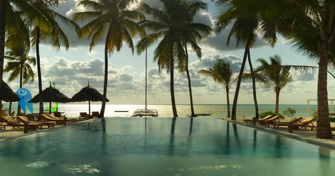 Timelapse of an infinity pool and the ocean at Zanzibar islands. Africa