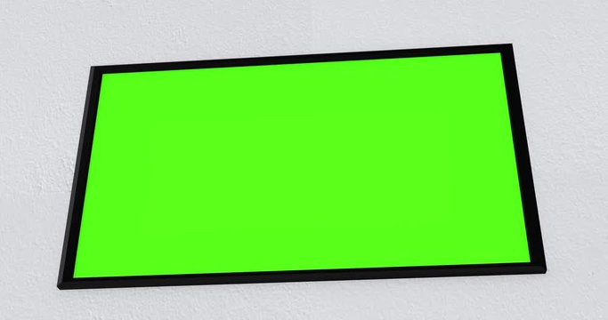 Camera pans across modern flatscreen 4K UHD TV on wall