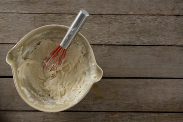 Whisk inside a semi kneaded dough