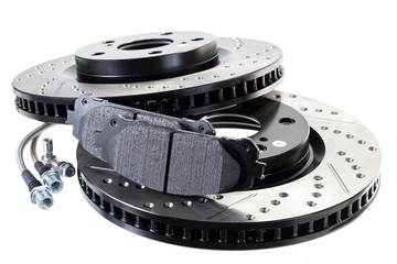 brake disc, pad and reinforced brake hose on a white background