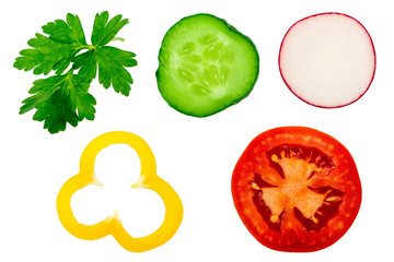 slices of vegetables on white isolated background