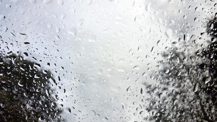raindrops on the windshield of a vehicle, captured from within