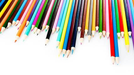 Colour pencils isolated on white background. Abstract background