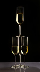 four Champagne glasses