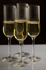 four Champagne glasses