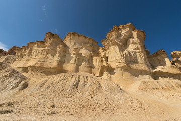 Desertic landscape of Erosion rocks, natural formations in Bolnuevo, Murcia, Spain.