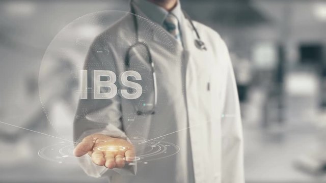 Doctor holding in hand IBS